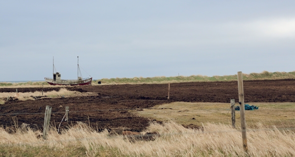 Ship in the field along the road in the Reykjanes Peninsula