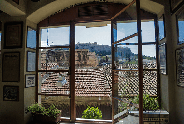 View of the Acropolis from Coffee Shop in Athens, Greece by Wander The Map